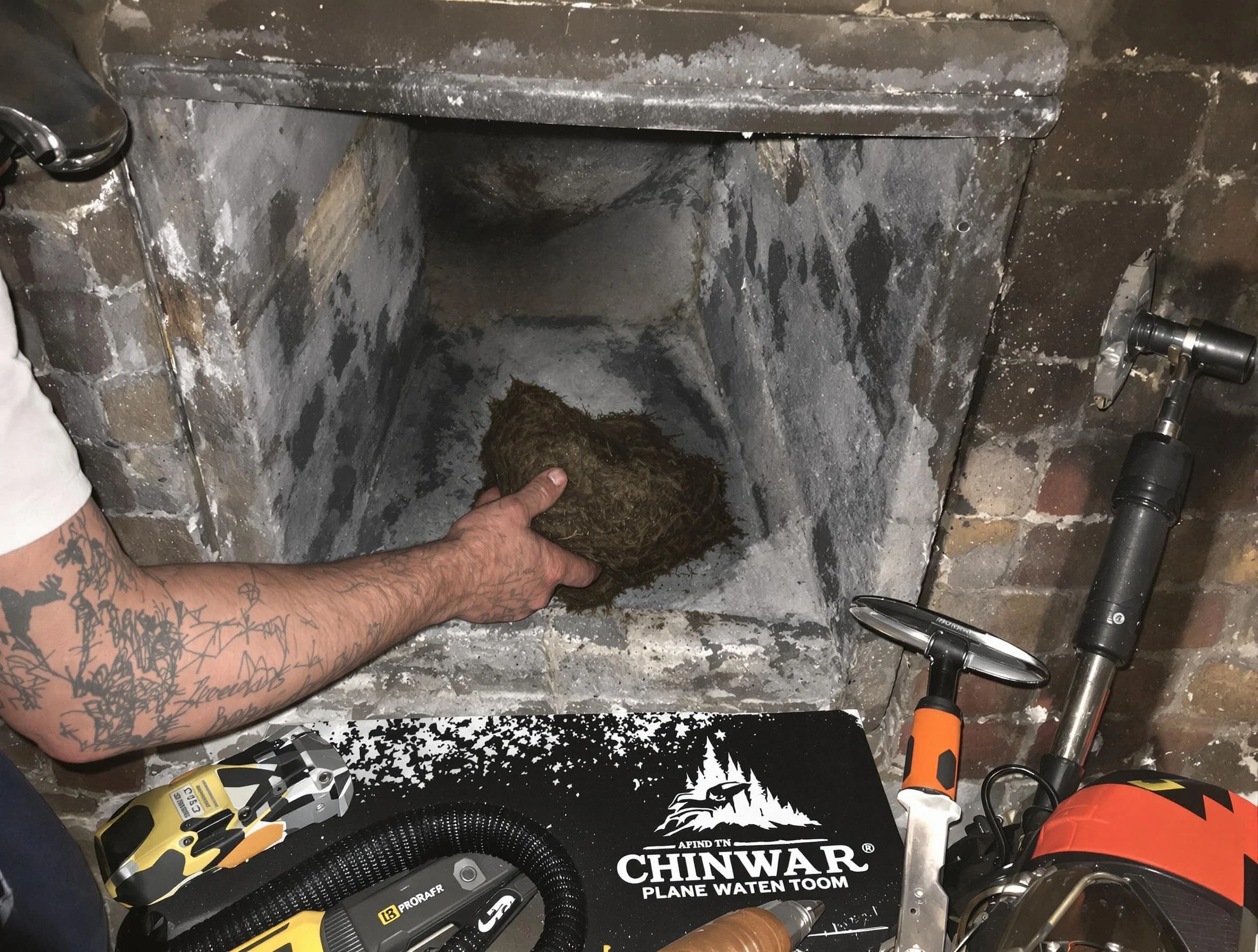 Hillsborough Chimney Sweep safely removing debris and screening chimney in Hillsborough, NJ